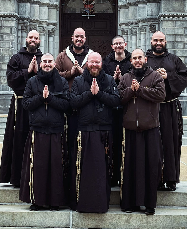 Friars of Jesus Christ standing together